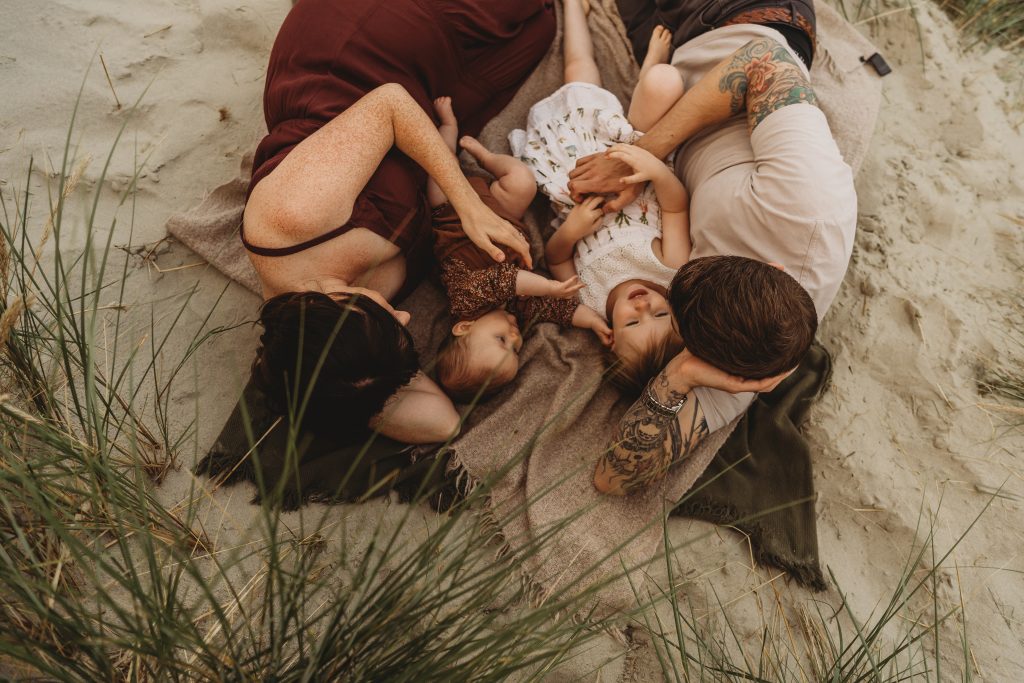  photo from above of family with new baby