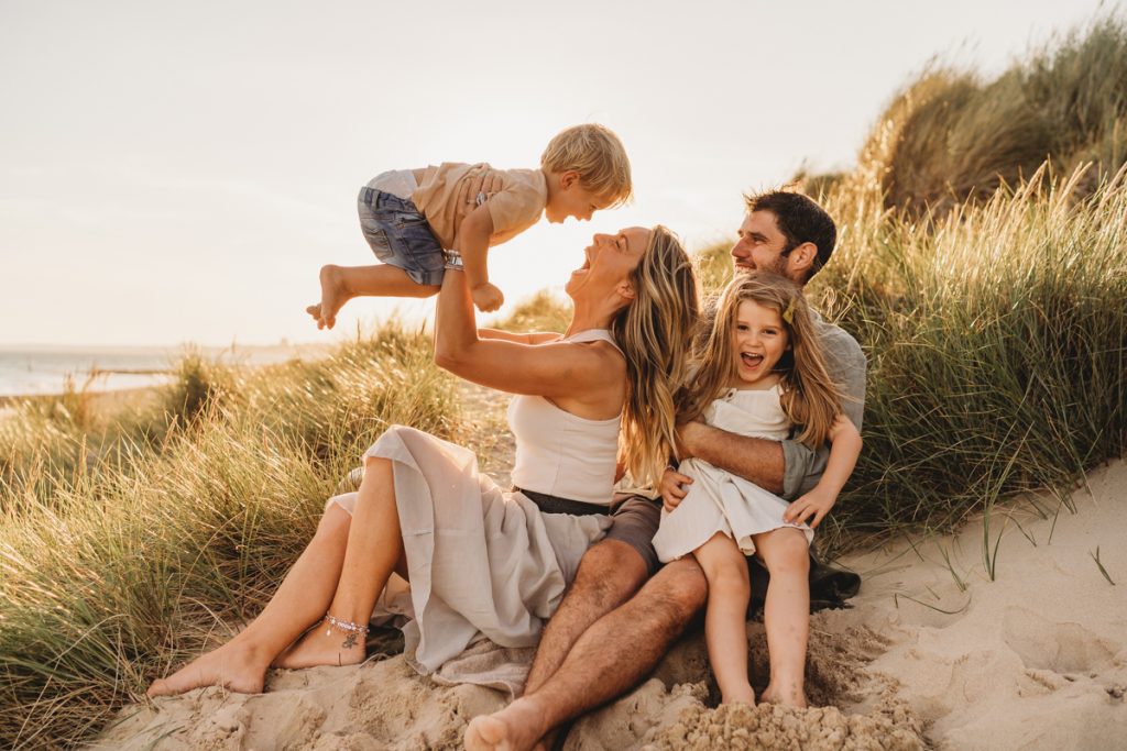 fun, relaxed family nestled in the dunes on the beach in dorset 