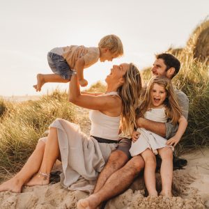 fun, relaxed family nestled in the dunes on the beach in dorset