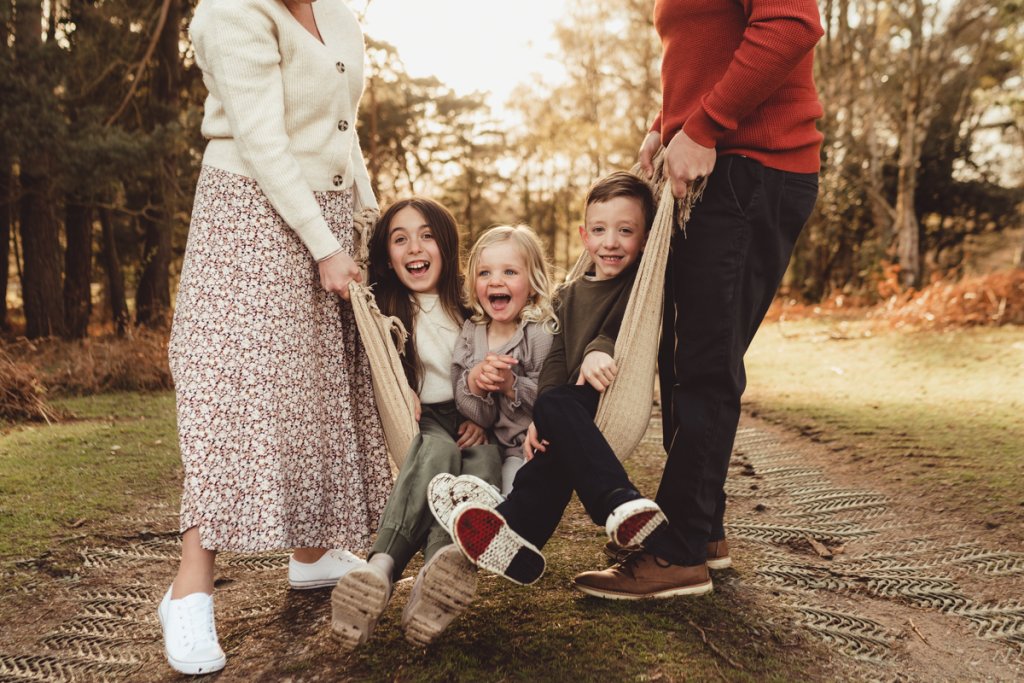 Candid moments of love and joy in a New Forest family photography session