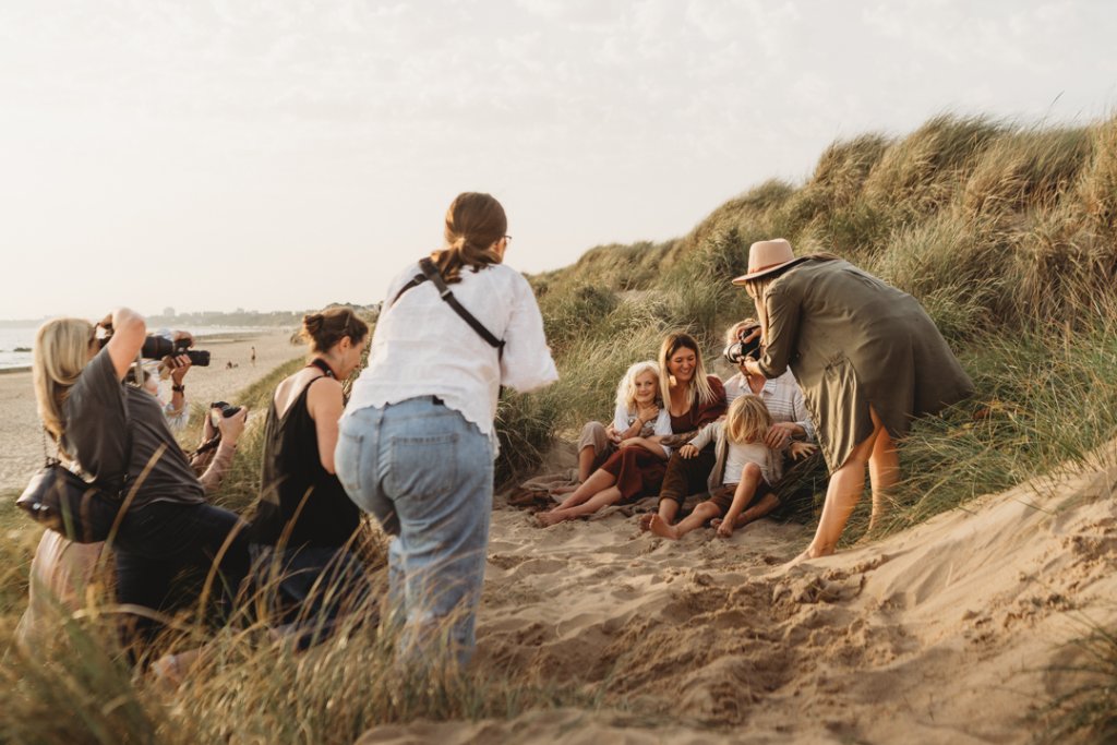 family photography education and mentoring on a beach with photographers