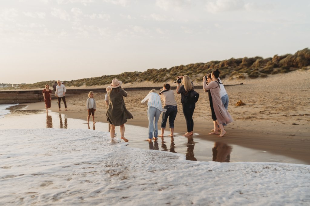 family photography education and mentoring on a beach with photographers