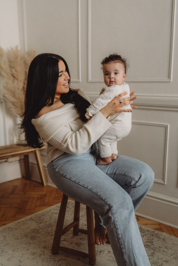 motherhood photoshoot dressed down denim and cosy knit vibes